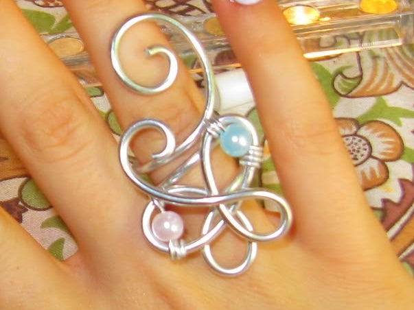 Swirly baby blue & pink butterfly ring